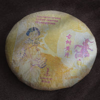 pu'er tea pressed in brick cake from Lunan mountain, Yunnan, from ancient trees gushu, huangpian yellow leaves