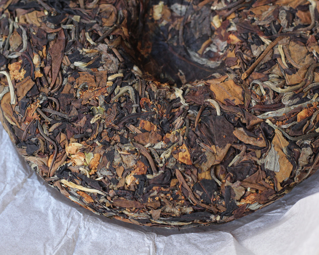 Nannuo Tea Flowers and White Tea Leaves, Wild Forest stone-pressed Cake