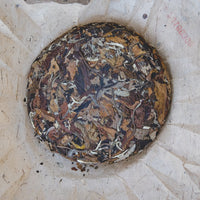 Chinese white tea Yueguangbai moonlight from Yunnan, pressed cake from organic forest, leaf detail
