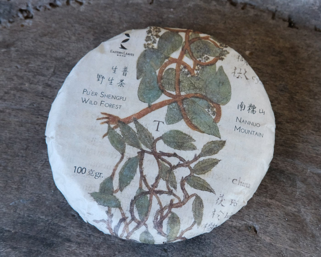 Nannuo Pu'er shengpu tea Chinese pressed cake brick vintage and aged, 2020 spring harvest, forest tea, from Yunnan