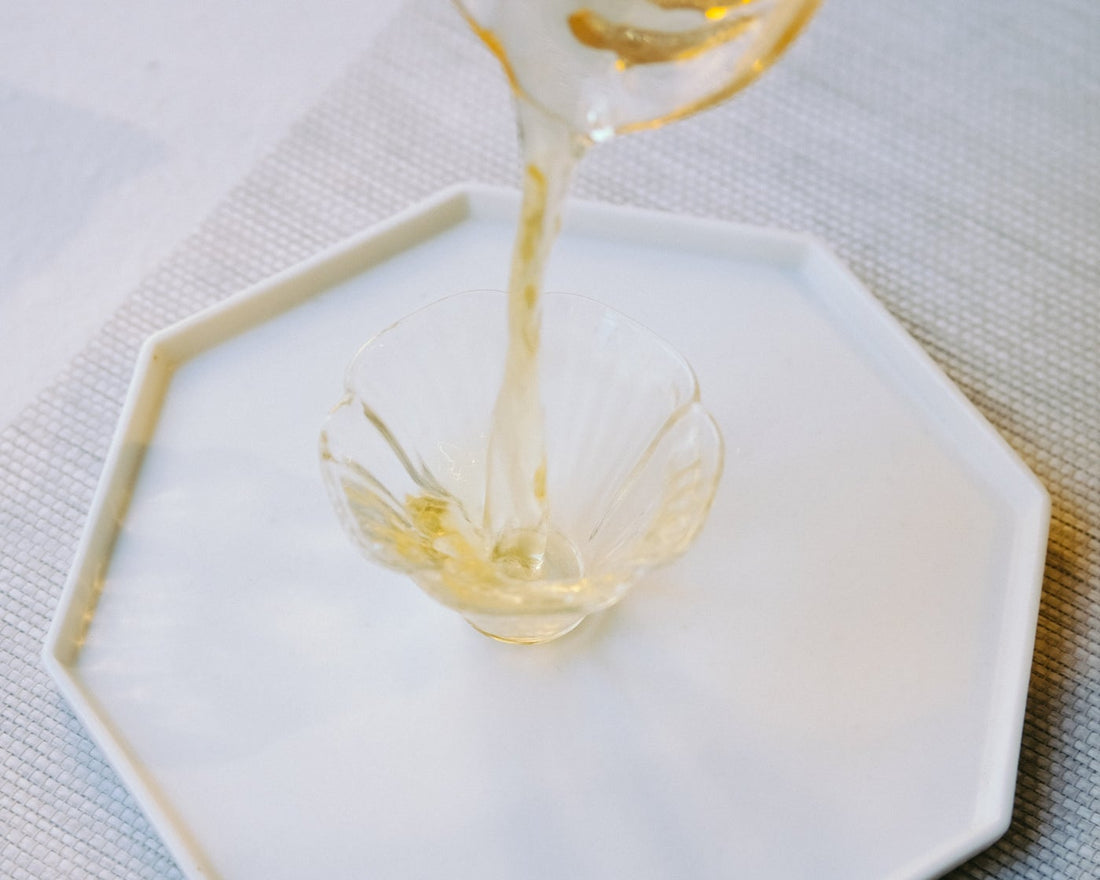 Camellia assamica flowers Daye tea, tea flower, from Yunnan China, infused in glass cup teaware in gongfucha