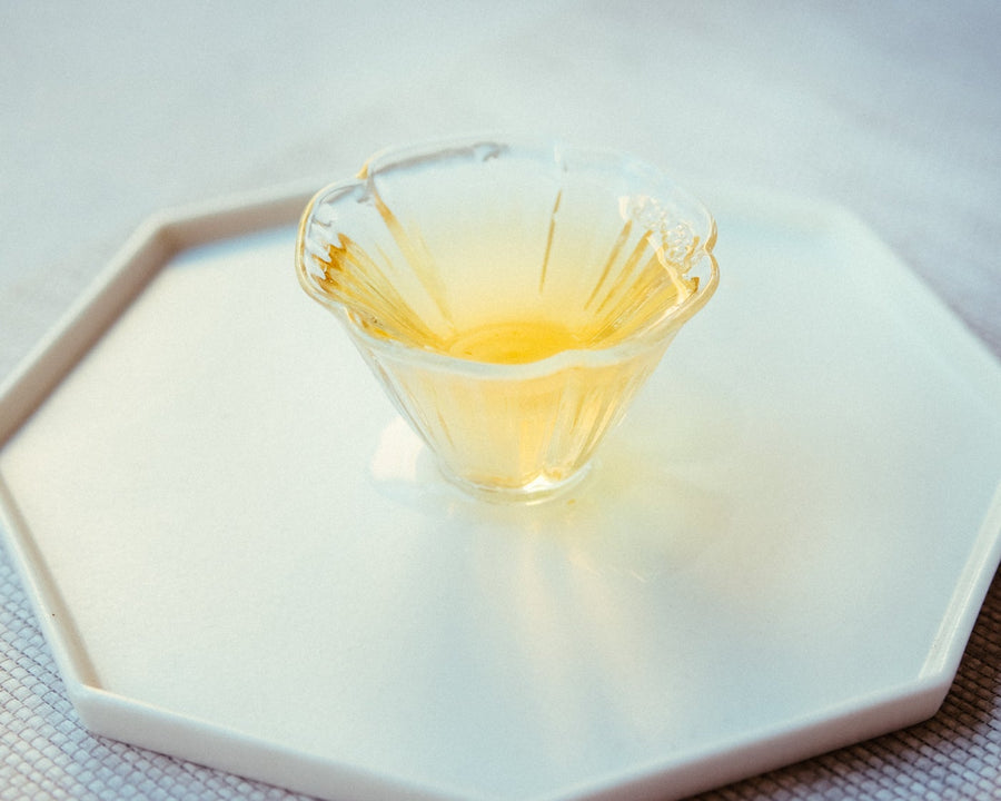 Camellia assamica flowers Daye tea, tea flower, from Yunnan China, infused in glass cup teaware in gongfucha