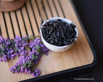 Tieluohan 铁罗汉 yancha wulong tea from Wuyishan, China, in white cup teaware and loose leaf tea